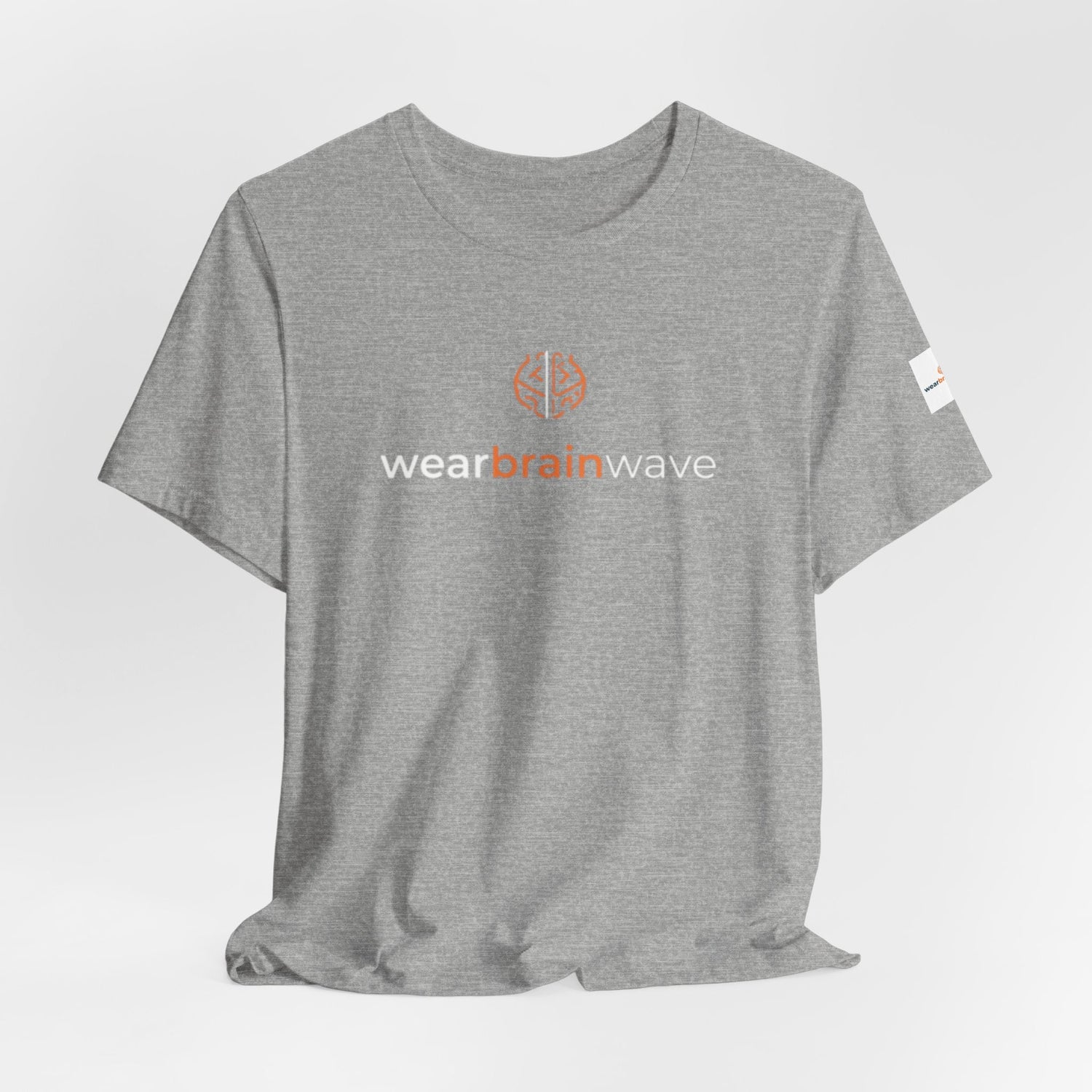 Minimal ADHD tees — a small geometric brain wordmark printed on a plain unisex t-shirt